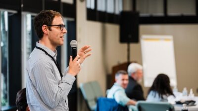 Benjamin Toff of the University of Minnesota talks at Poynter's Summit on AI, Ethics and Journalism in June 2024. Alex Smyntyna/Poynter