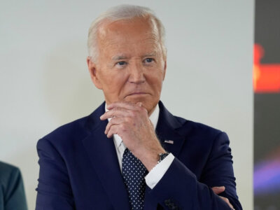 President Joe Biden listens during a visit to the D.C. Emergency Operations Center, Tuesday, July 2, 2024, in Washington. (AP Photo/Evan Vucci)